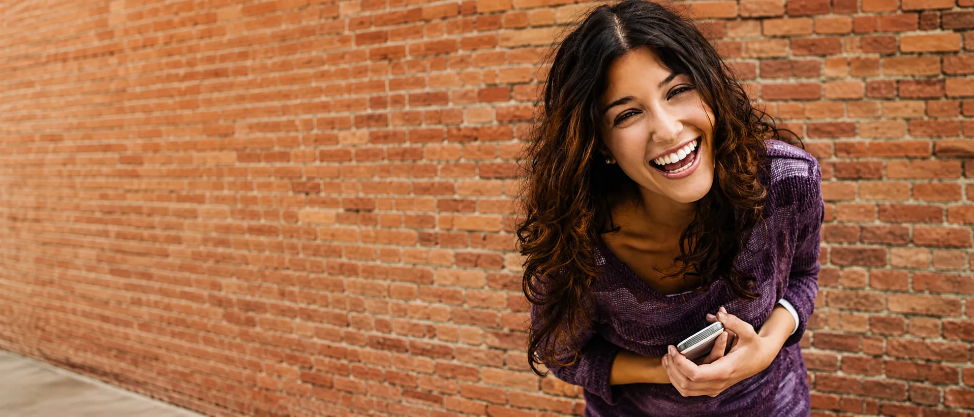 Woman with a bright, confident smile after cosmetic dentistry at Living Dental Health in Bend, Oregon